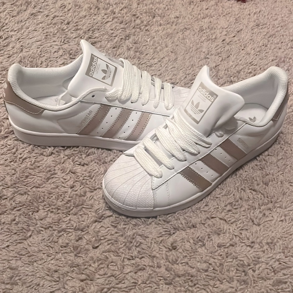 Rose gold and white shell top adidas